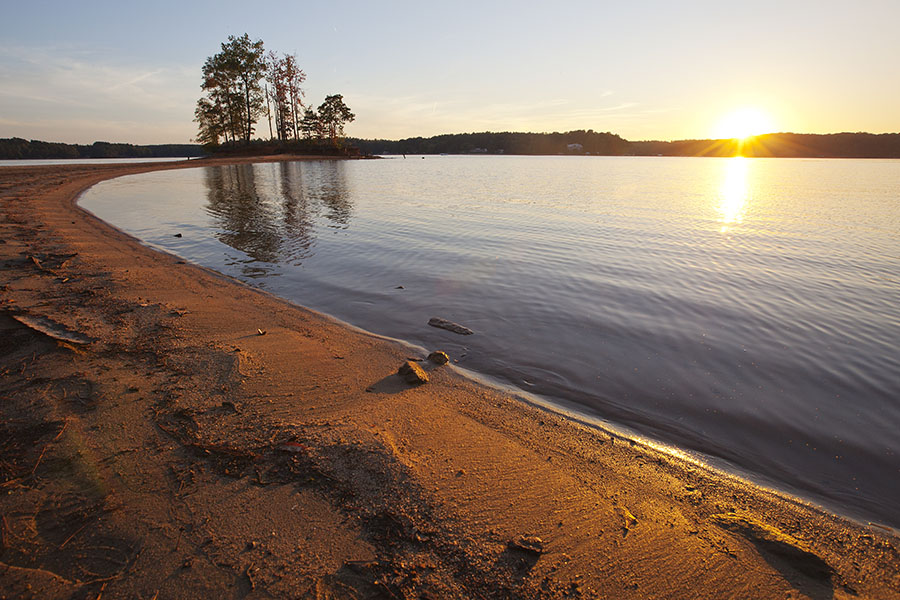 Huntersville, NC - Scenic View of the Lake Norman Shore at Sunset in Huntersville North Carolina